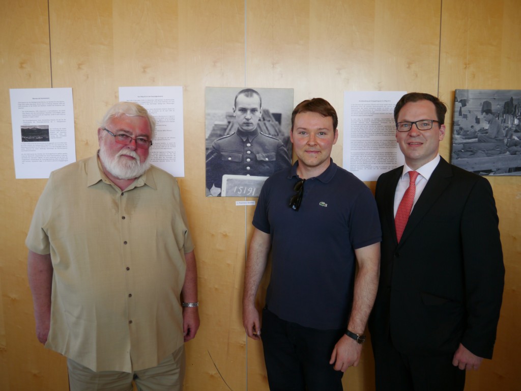 At the exhibit on Oflag VII-A in the local high school, pictured on the wall is my grandfather, Kazimierz Bendisz, in 1939