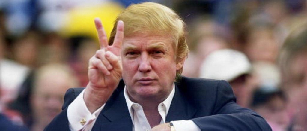 Donald Trump making a peace sign