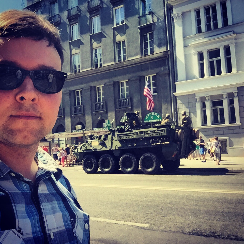 Me in front of an American Stryker vehicle at the Polish Armed Forces Day Parade in Warsaw, August 2015