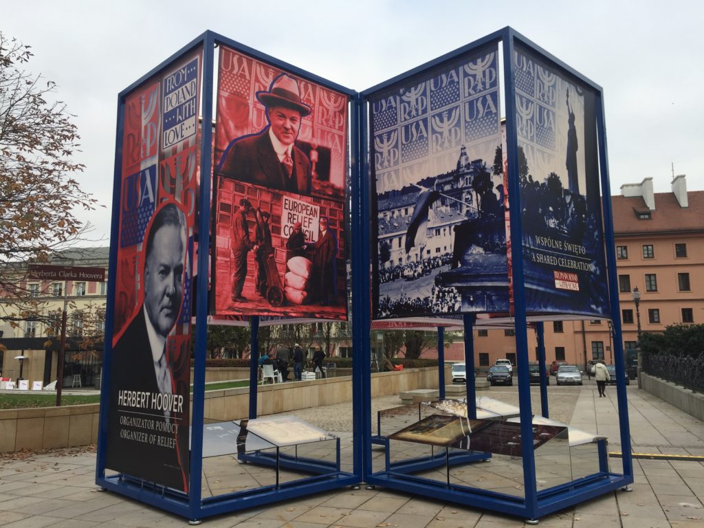 Images of Herbert Hoover on display panels in the From Poland With Love exhibit in Warsaw, Poland